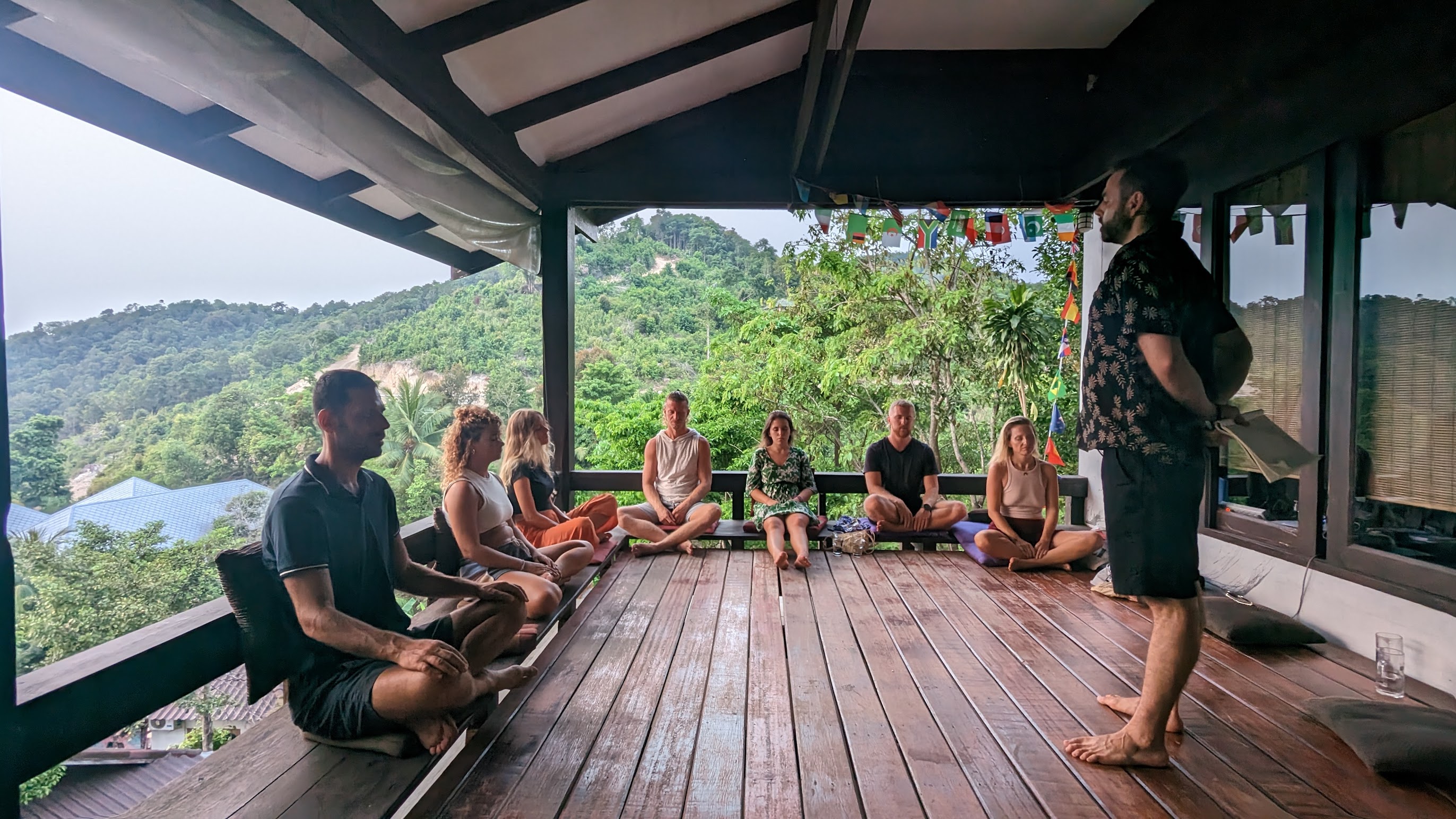 Barak Yaari facilitating a seated group in Thailand.